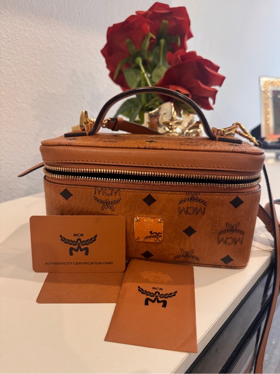 MCM Handbags - MCM Cognac Visetos Mini Vanity Bag with Gold Hardware